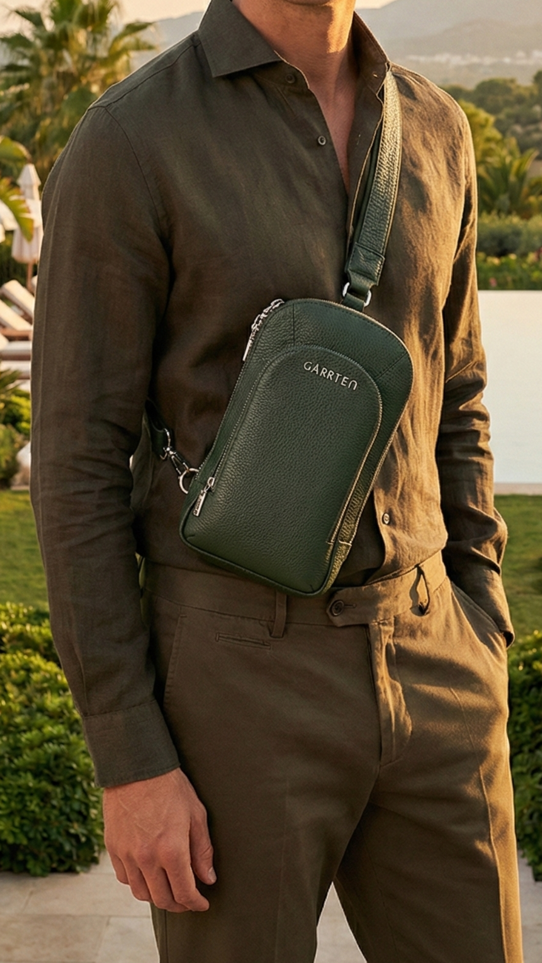 Garrten 518 Crossbody sling in green, worn by a man outdoors — lifestyle photograph