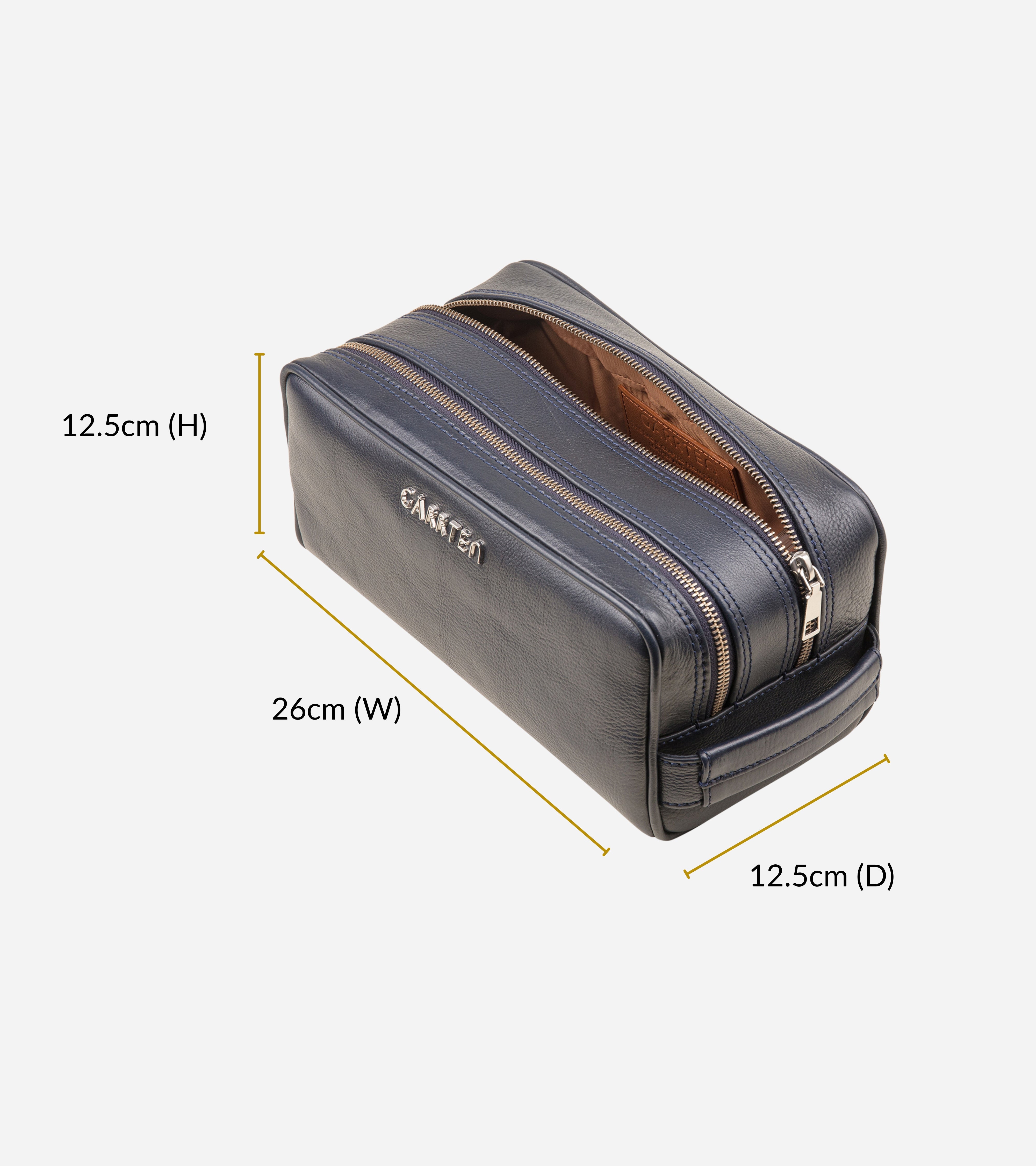 Dopp kit or toiletry bag style in midnight blue leather with measurements on a white background