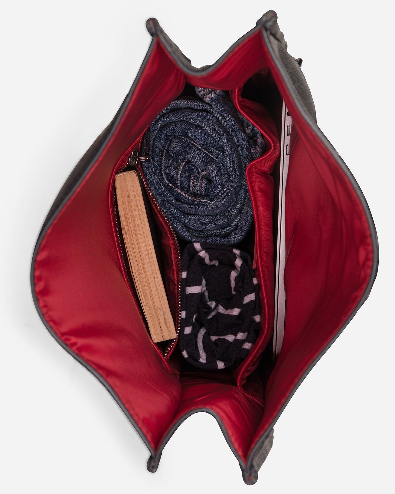 Carbon Black: top view showing inside capacity of Garrten rolltop style full grain leather backpack