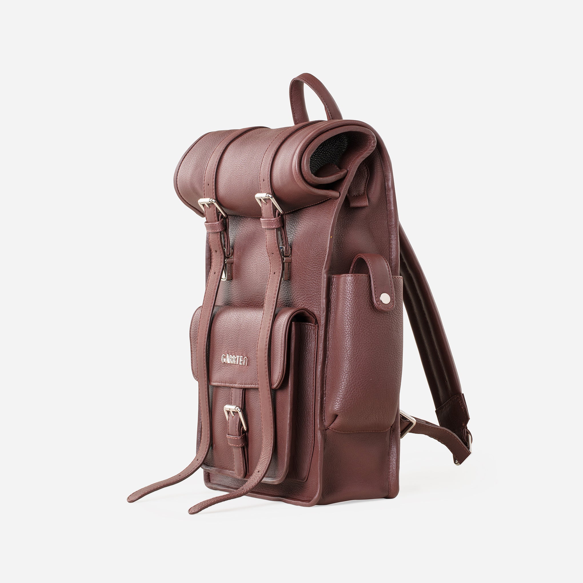 Vintage Mahogany Brown: right side view showing outer pocket of Garrten rolltop style full grain leather backpack