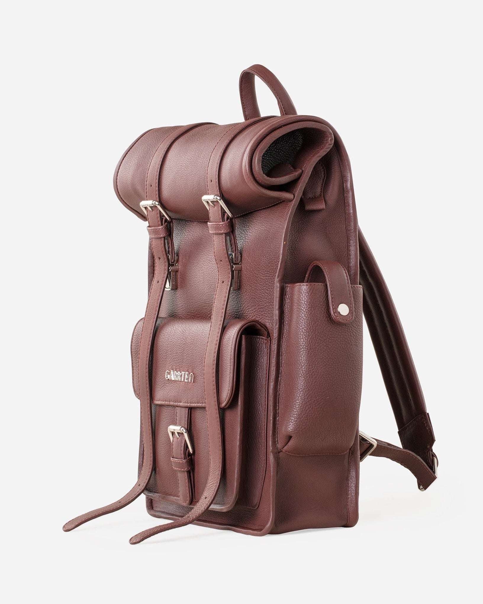 Vintage Mahogany Brown: right side view showing outer pocket of Garrten rolltop style full grain leather backpack