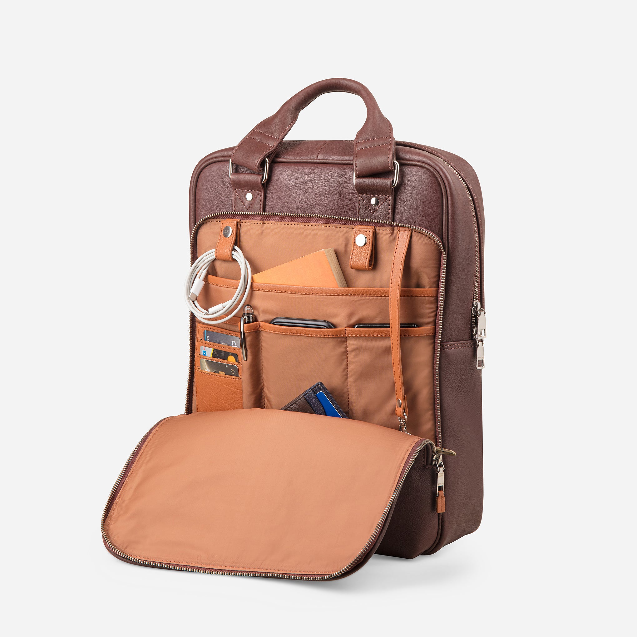 Vintage Mahogany Brown: front open pocket with cinnamon interior and multi pockets of Garrten signature convertible leather backpack