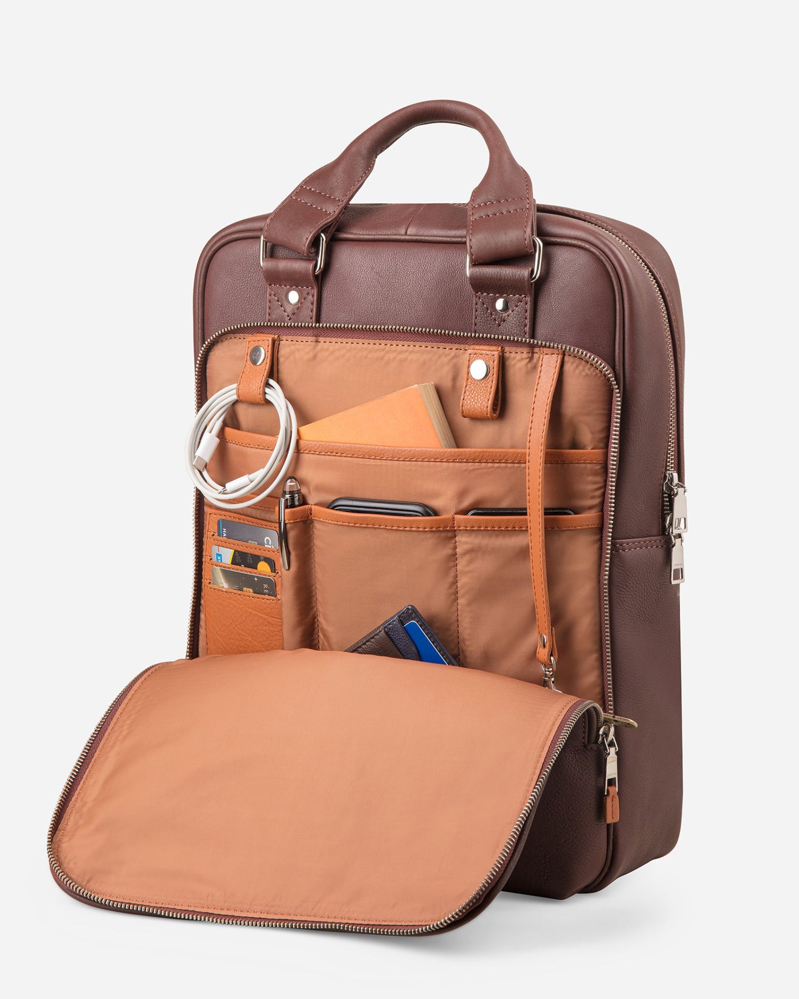 Vintage Mahogany Brown: front open pocket with cinnamon interior and multi pockets of Garrten signature convertible leather backpack