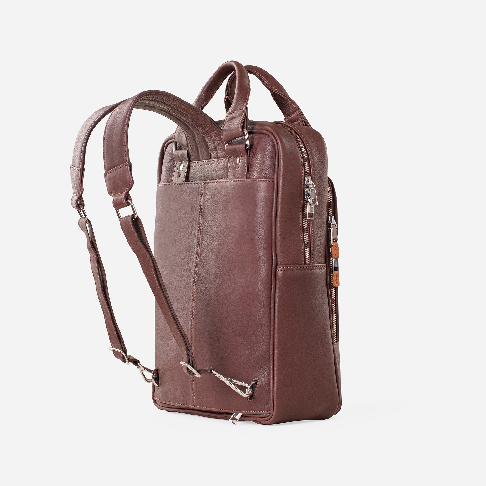 Vintage Mahogany Brown: side view showing leather padded straps of Garrten signature convertible full grain leather backpack