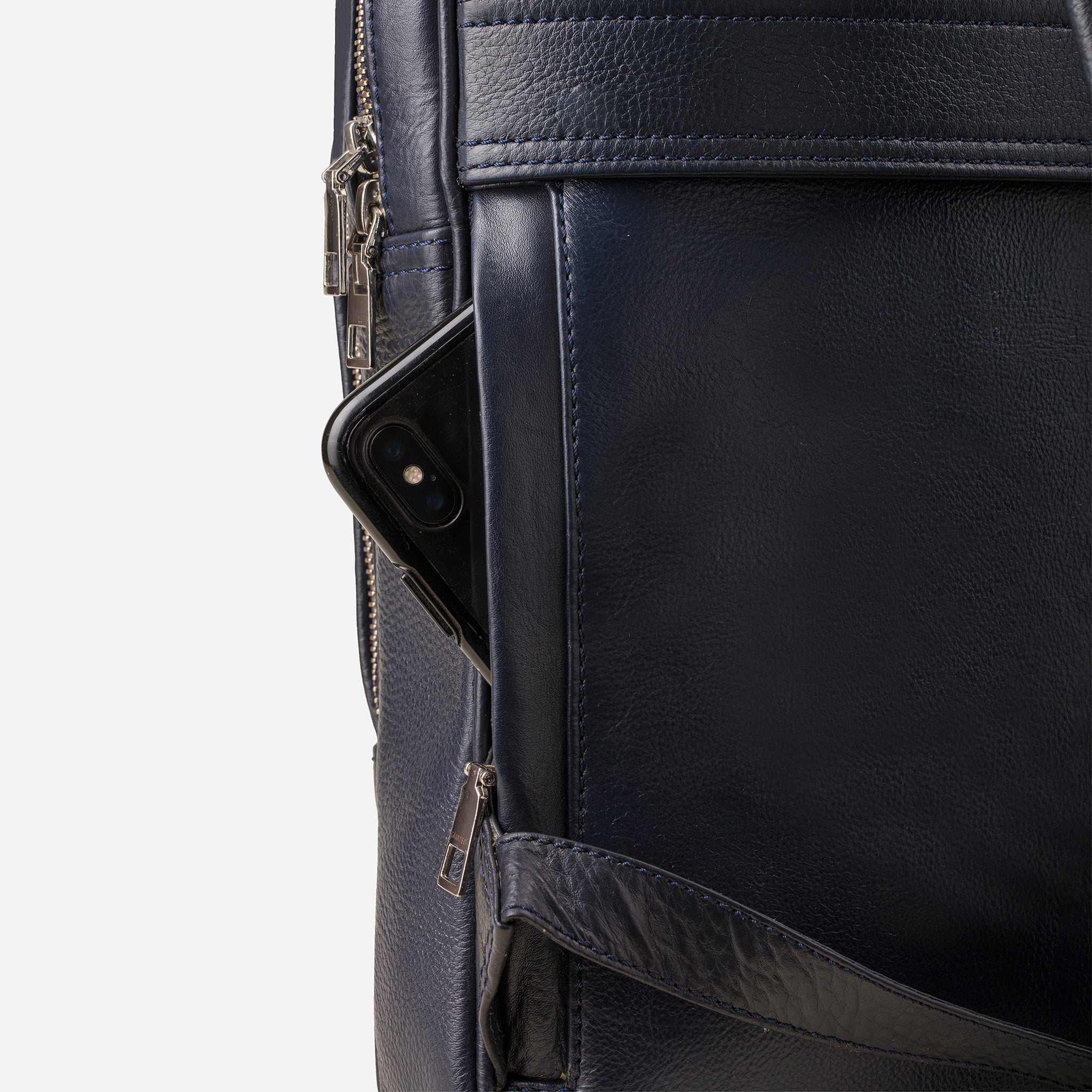 Midnight Blue: back view showing quick access pocket of Garrten slim full grain leather backpack