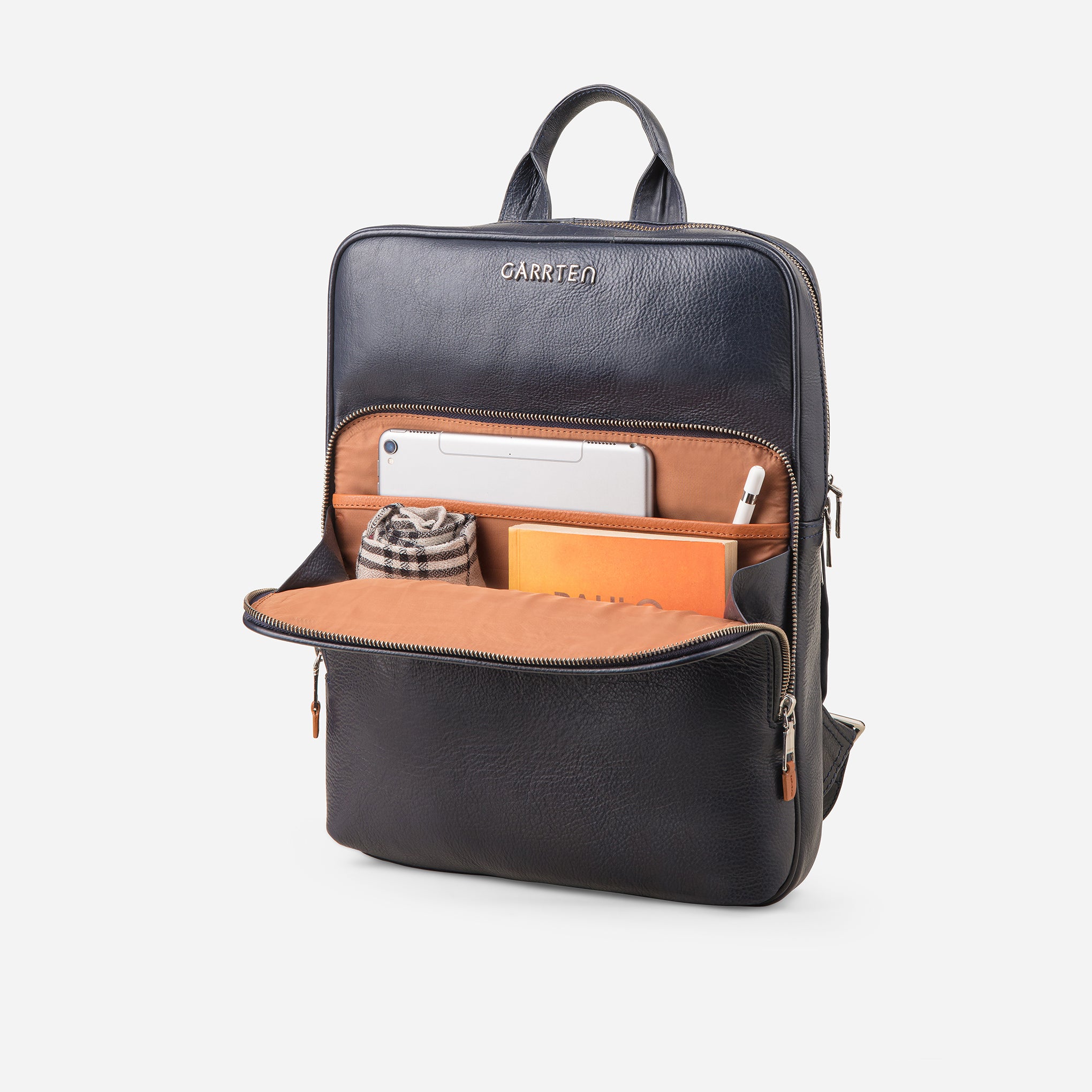 Midnight Blue: front open compartment with cinnamon interior and tablet pocket of Garrten slim full grain leather backpack