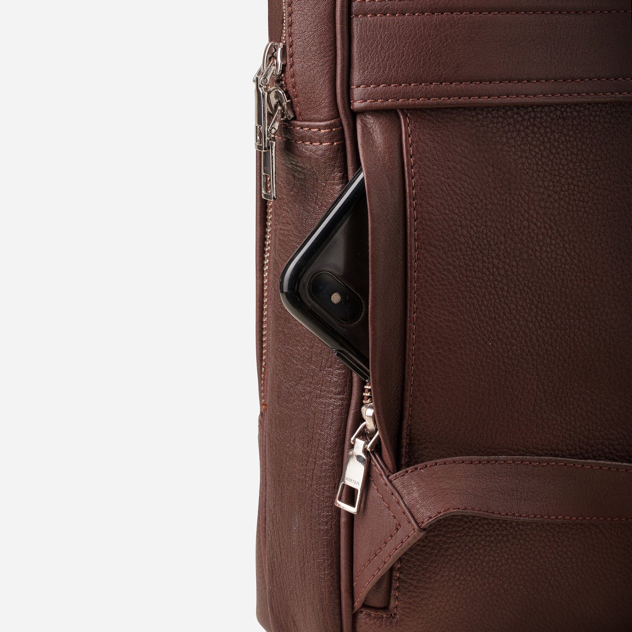 Vintage Mahogany Brown: back view showing quick access pocket of Garrten slim full grain leather backpack
