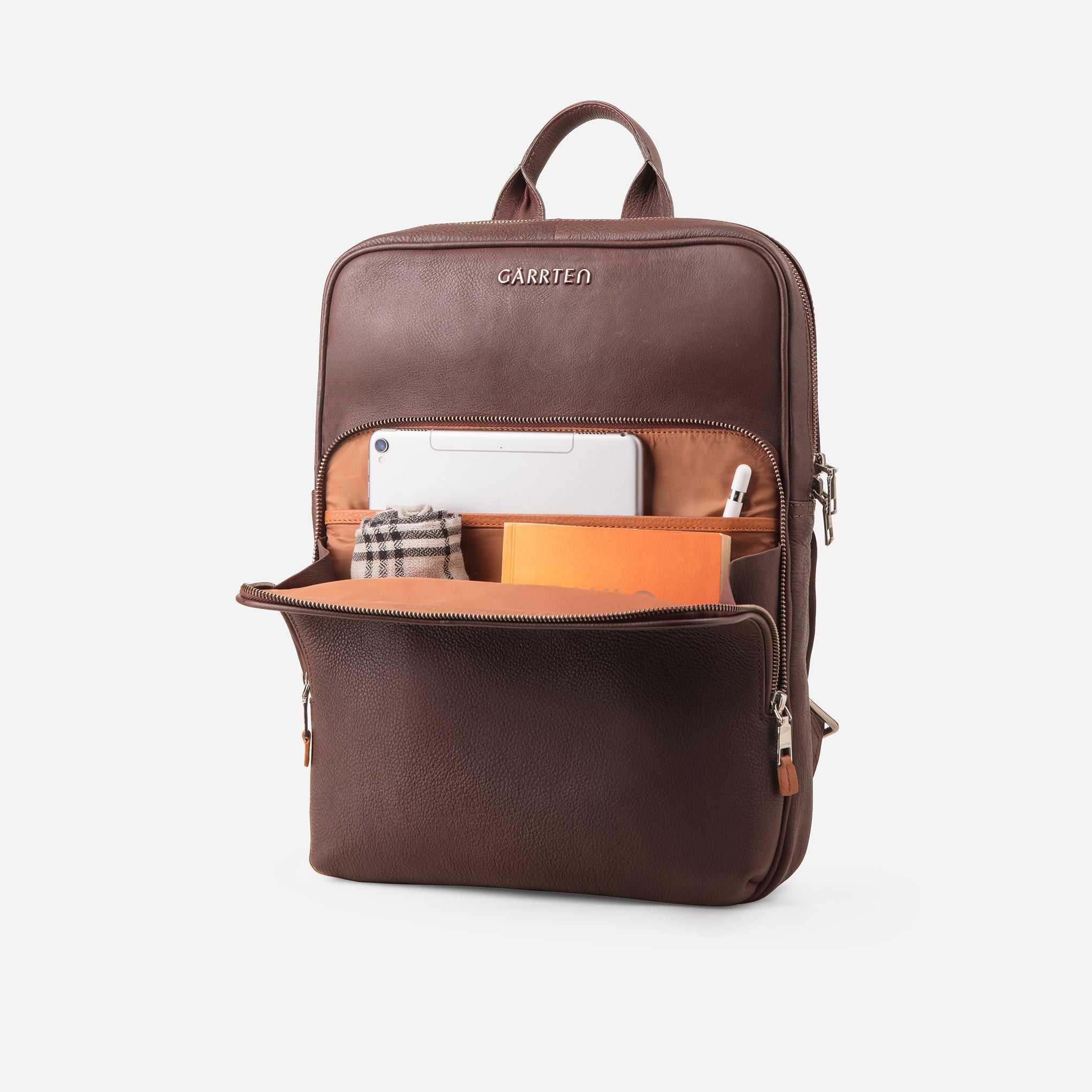 Vintage Mahogany Brown: front open compartment with cinnamon interior and tablet pocket of Garrten slim full grain leather backpack