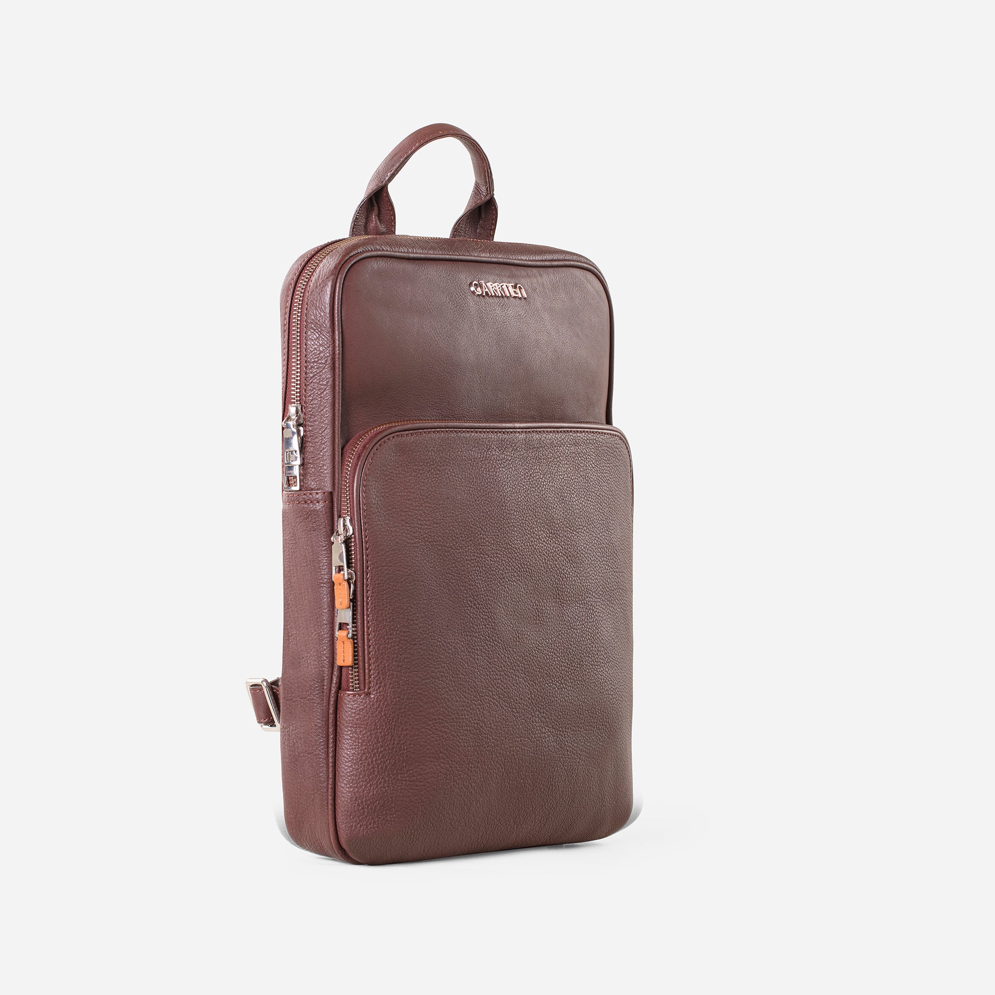 Vintage Mahogany Brown: tilt view of Garrten slim full grain leather backpack
