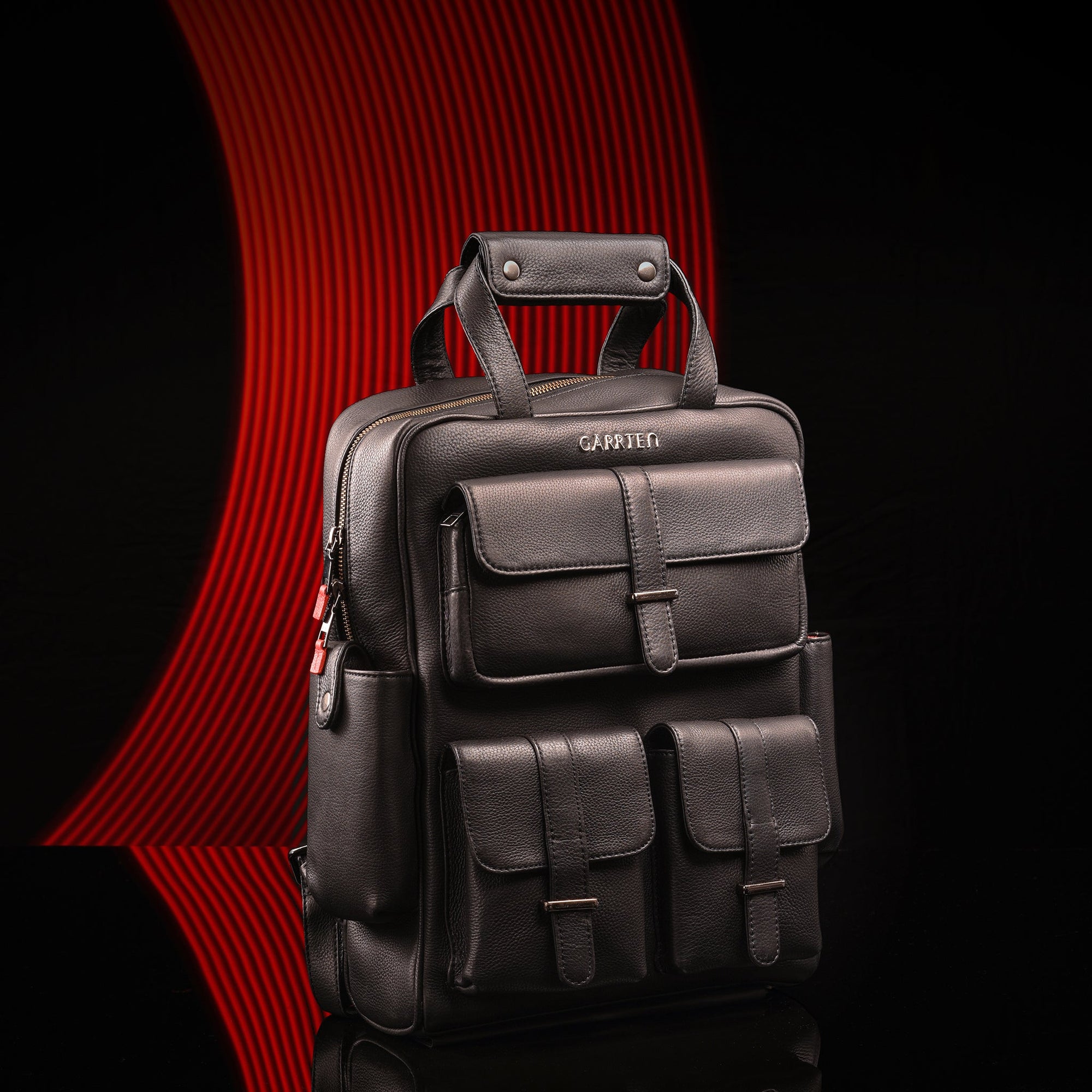 Carbon Black: tilt view of Garrten travel full grain leather backpack-moodshot