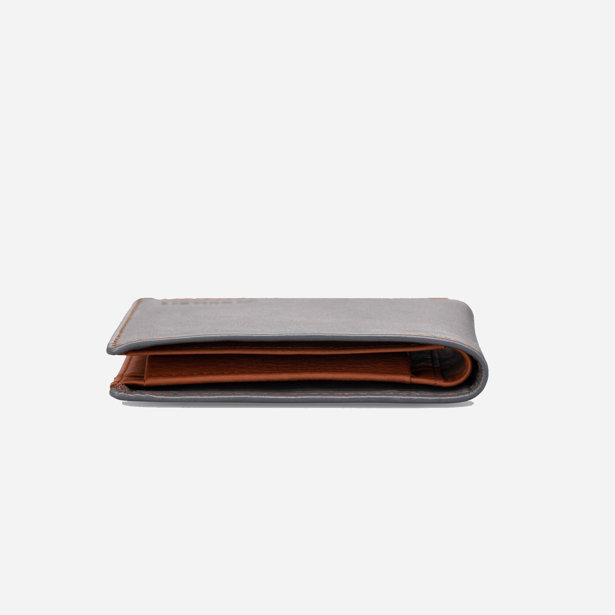 Grey/Tan: top view of Garrten slim full grain single billfold leather purse