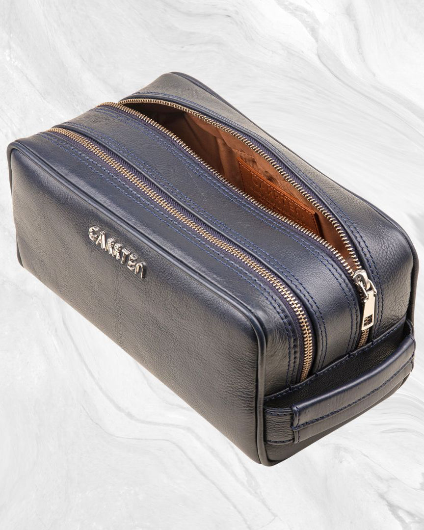 Blue: tilted front view of Garrten full grain leather dopp kit