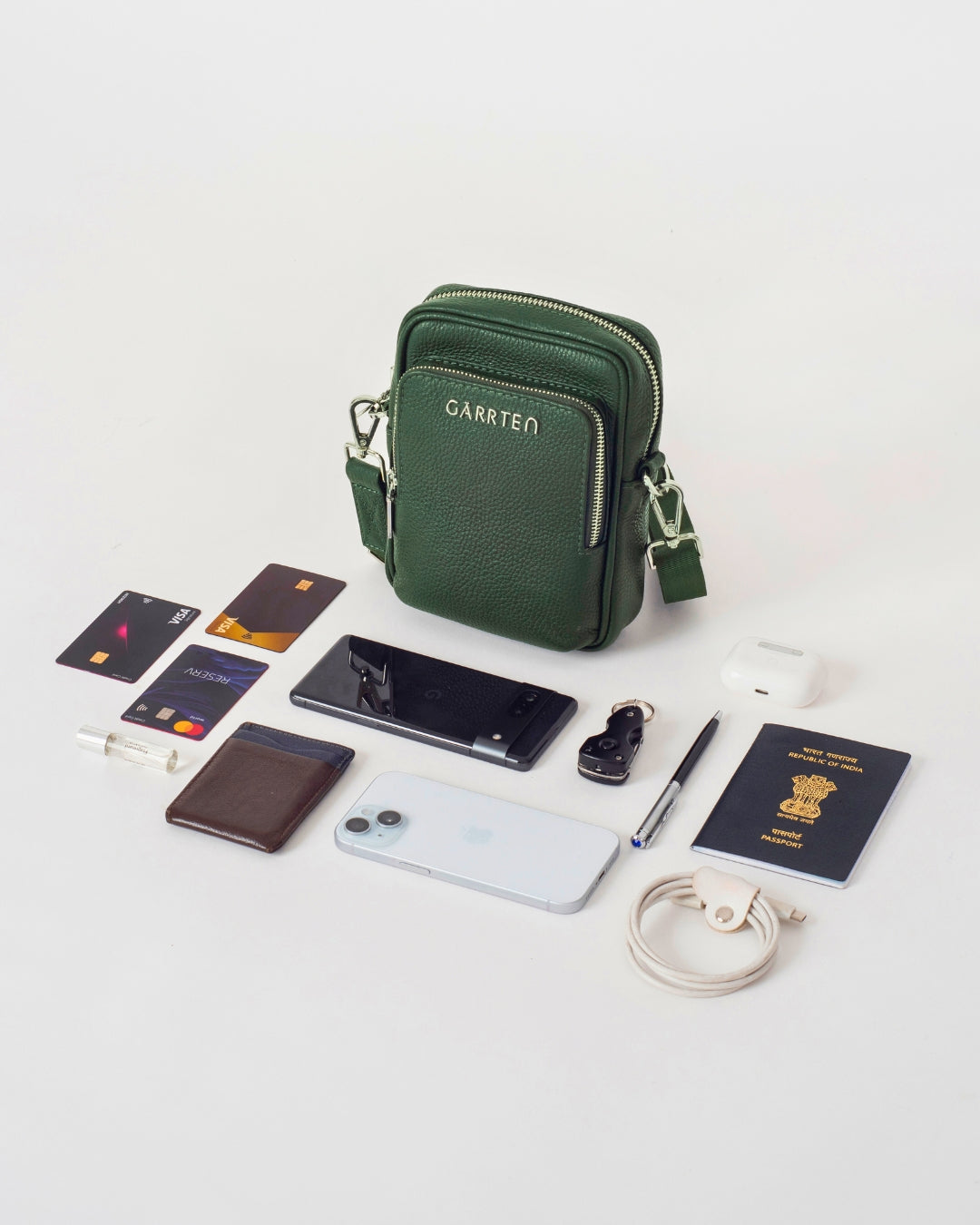 GARRTEN 508 leather mini crossbody bag in forest green— flatlay 