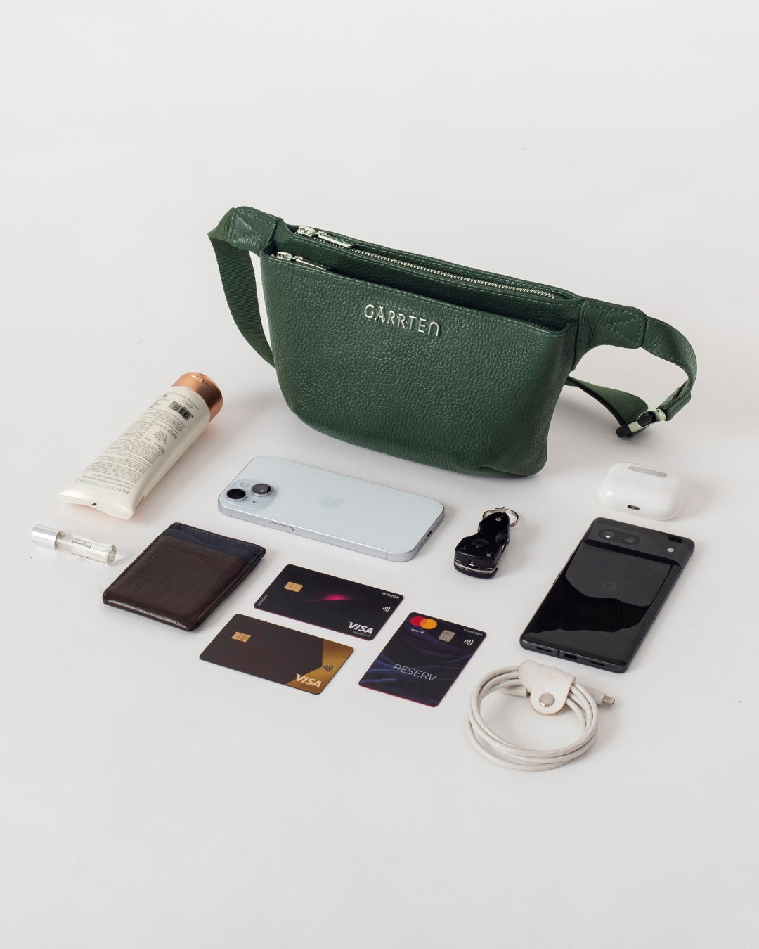 GARRTEN 528 leather crossbody belt bag in forest green— flatlay 