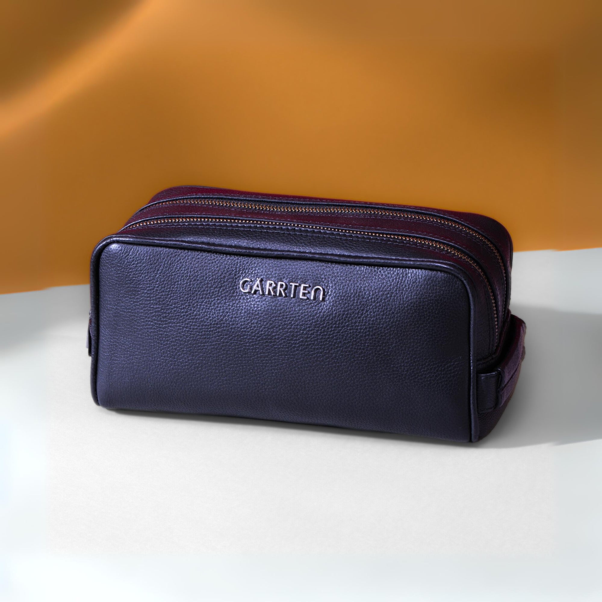 Midnight Blue: tilted front view of Garrten full grain leather dopp kit