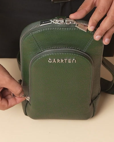 GARRTEN 518 forest green italian leather crossbody sling bag — product video thumbnail showing woven strap adjustment and zipper pockets
