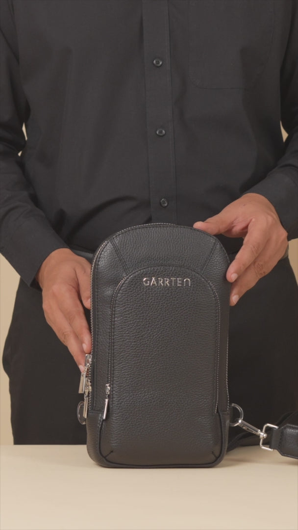 GARRTEN 518 leather crossbody sling in carbon black — product video in vertical format showing bag features by a man in black formal attire