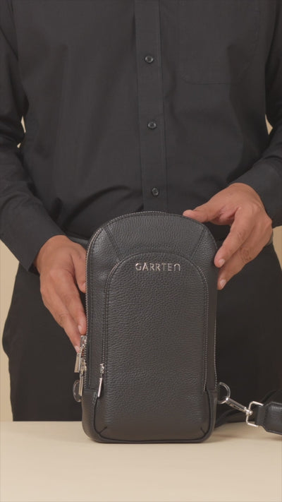 GARRTEN 518 leather crossbody sling in carbon black — product video in vertical format showing bag features by a man in black formal attire