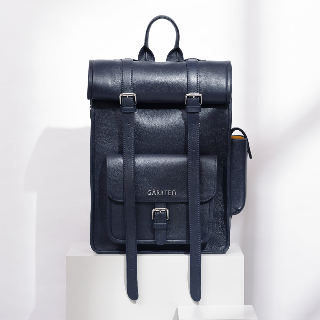 Midnight Blue: front view of Garrten rolltop style full grain leather backpack