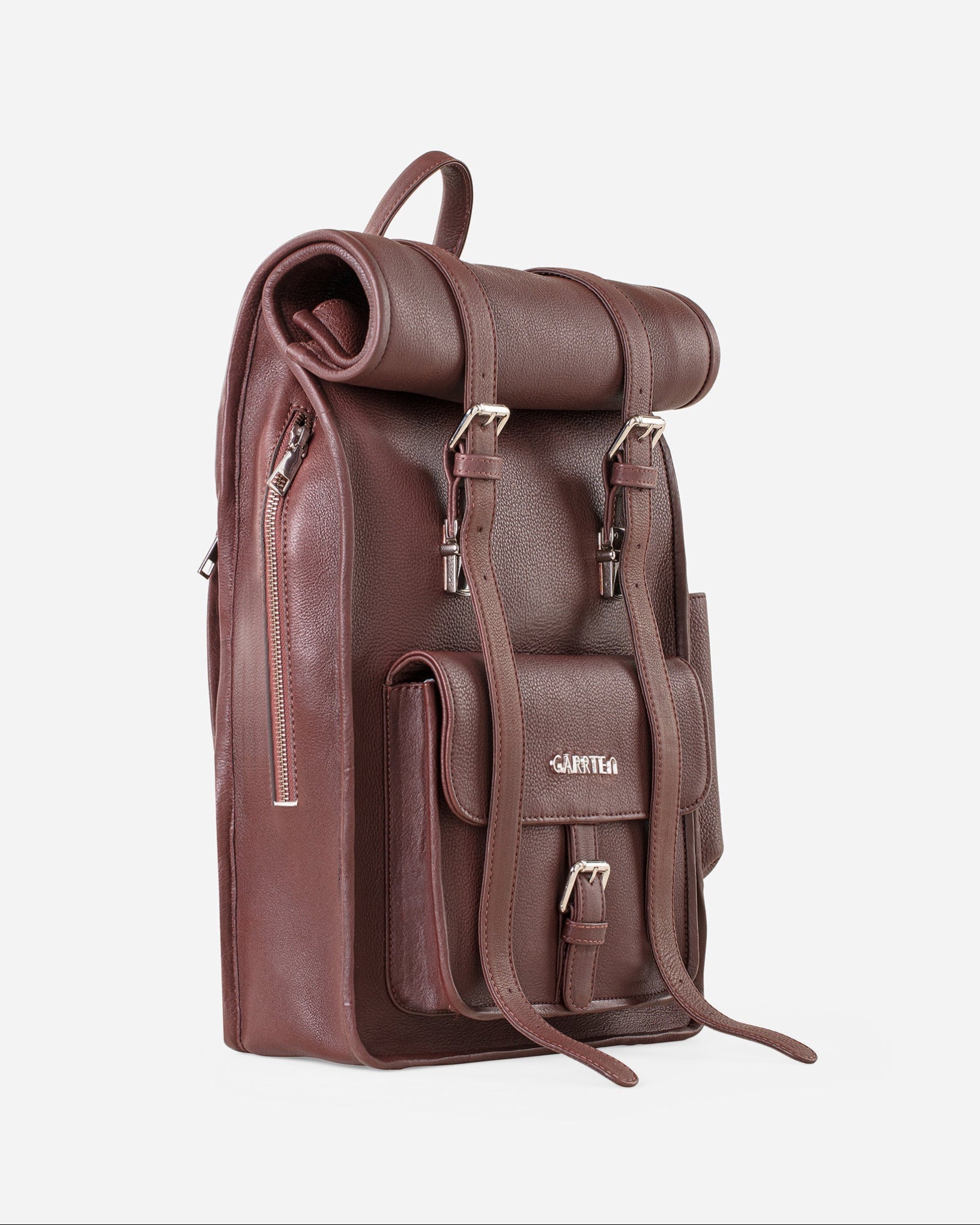 GARRTEN 751 rolltop full-grain leather backpack in vintage mahogany brown — diagonal view in rolled position showing side zipper quick-access pocket and silver hardware, white background