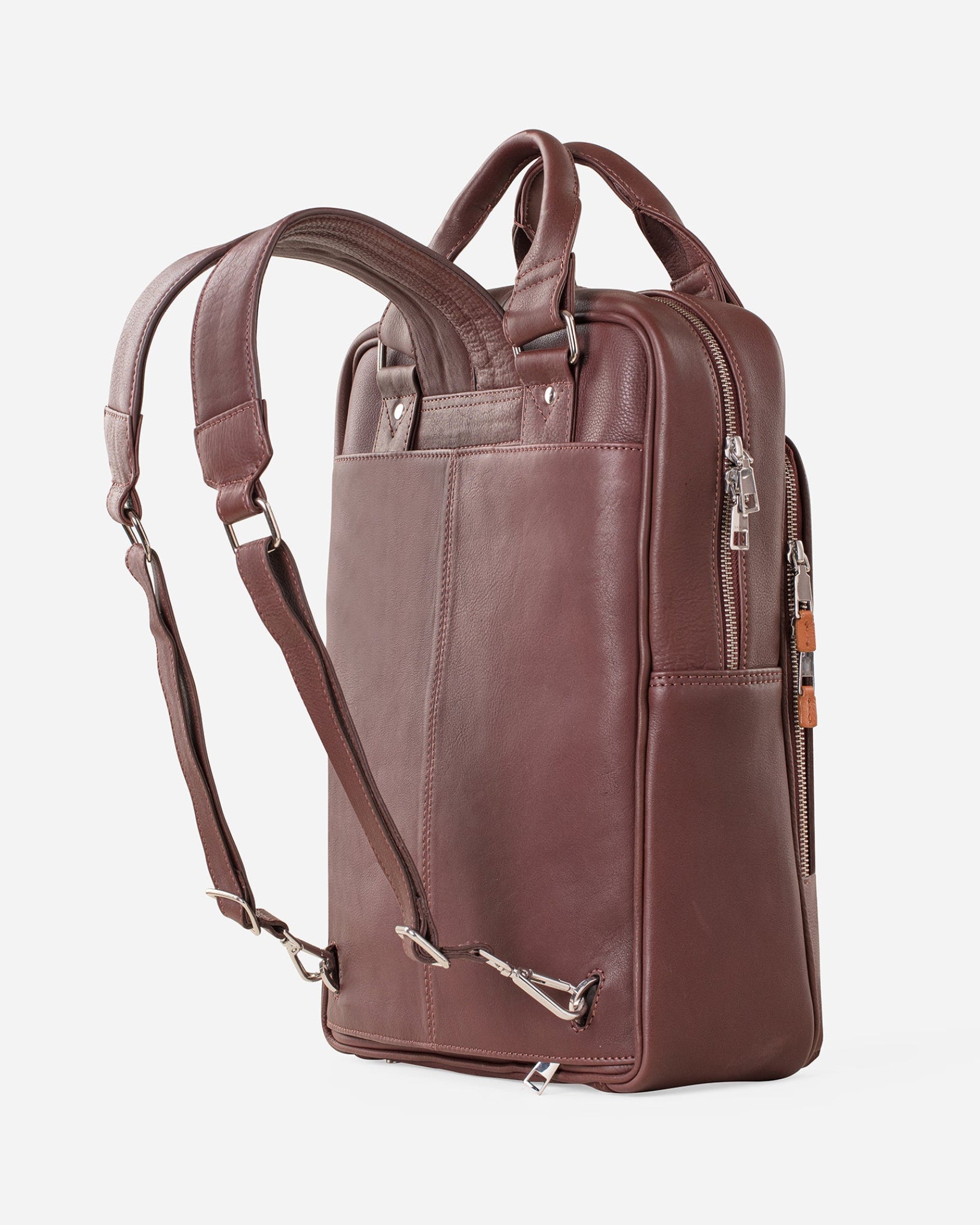 Vintage Mahogany Brown: side view showing leather padded straps of Garrten signature convertible full grain leather backpack