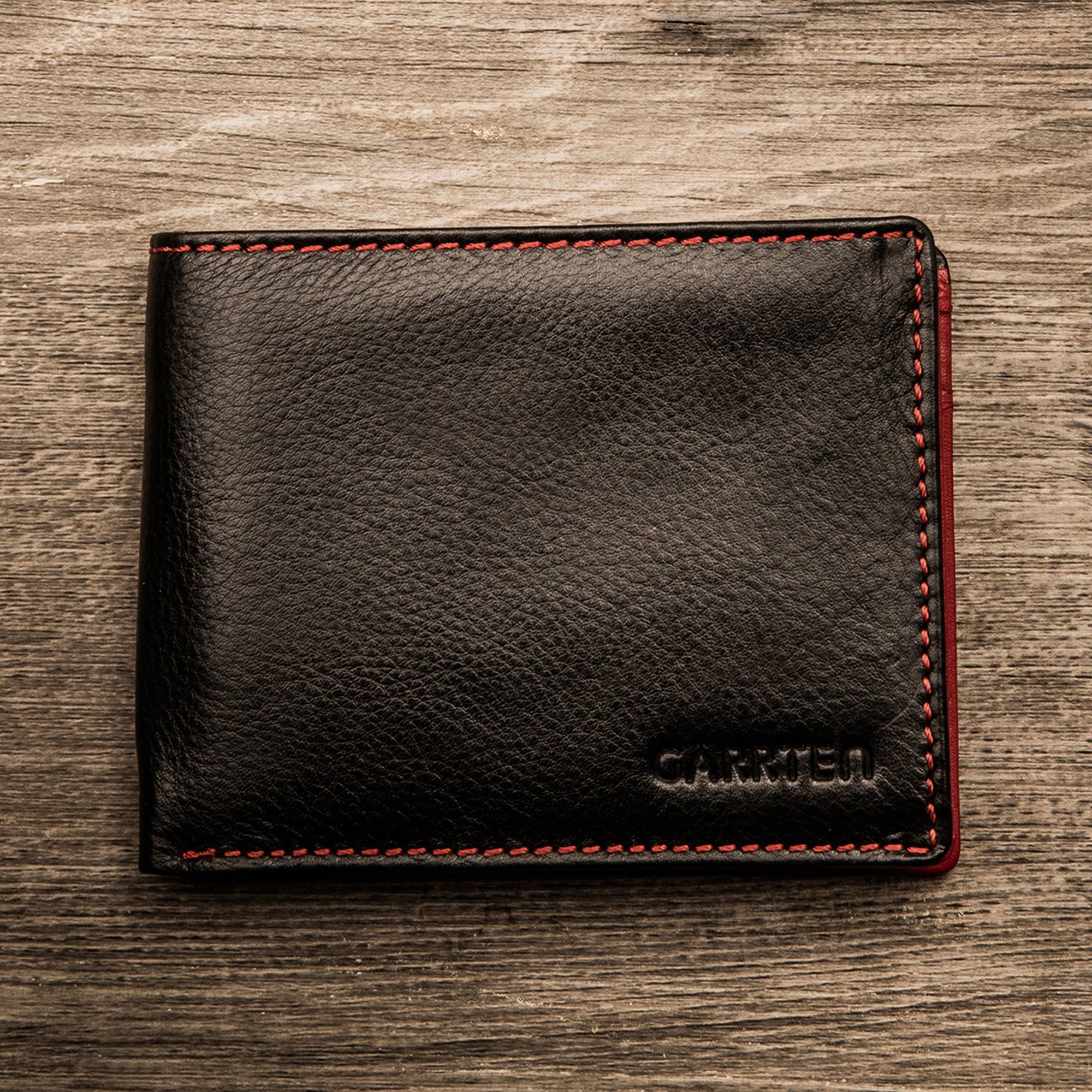Black/Red: front view of Garrten full grain leather purse in  black & red-moodshot