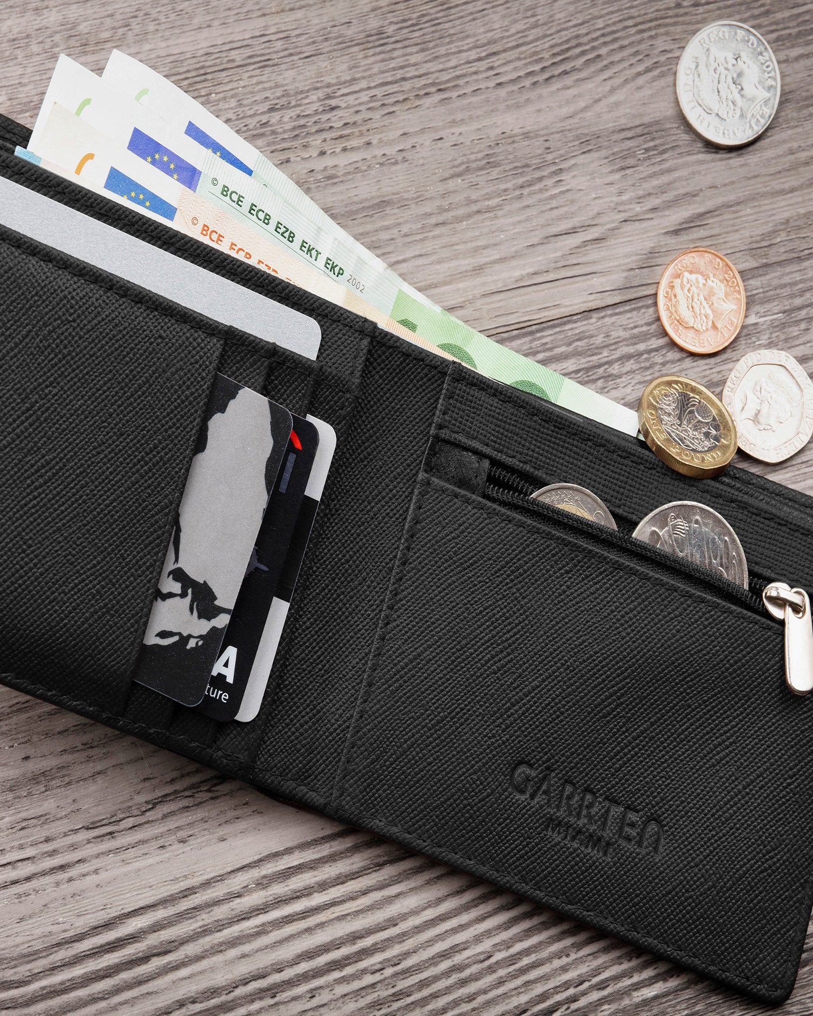 GARRTEN 319 saffiano leather wallet Prussian blue/black — open billfold on wooden surface showing zipper coin pocket and card slots